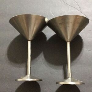 Pair of threshold, stainless steel martini glasses